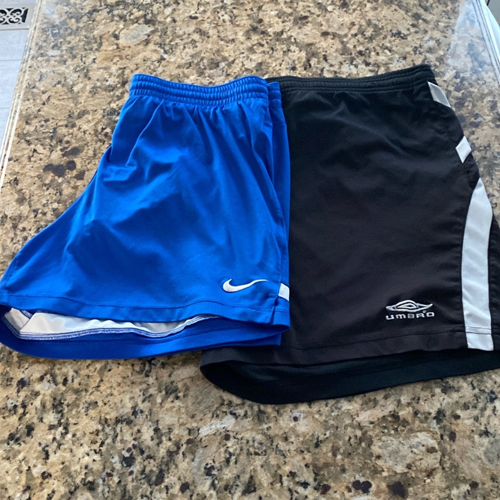 2 pair of shorts nike and umbro size large